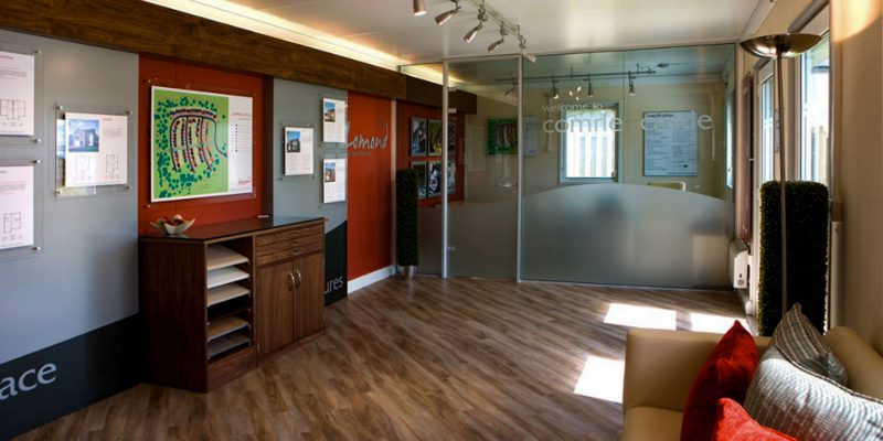 Interior of Marketing Suite with Glass Partition and Office