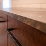 Furniture componentry with industrial metallic finishes