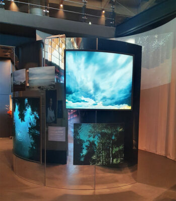 Audio-visual presentation, with high-resolution graphics set within a mirrored wall created